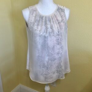 White House, black market sleeveless blouse size 2
